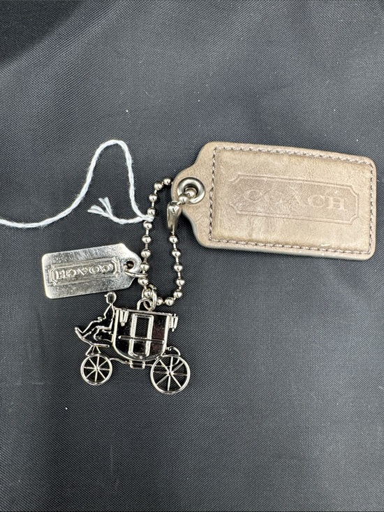 Coach Accessories - Coach Metallic Silver Coach Carriage Keychain with Gray Leather Tag